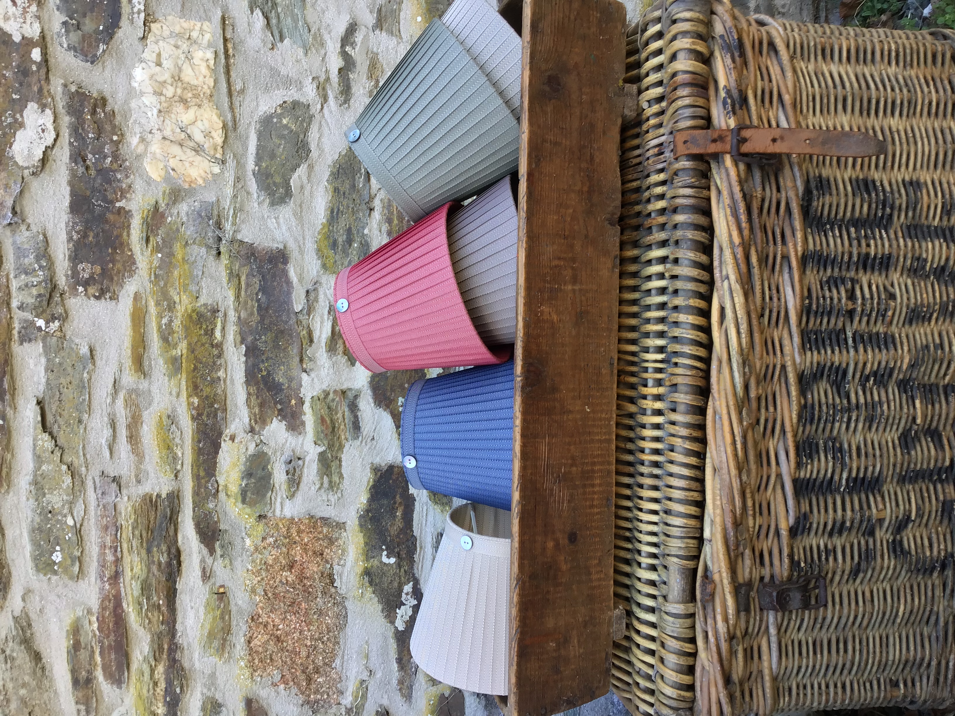 Barrington Ribbon Lampshades in wooden trough on basket