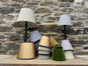 Collection of ribbon lampshades in gold grey and green